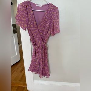 Floral flowy dress clips in front